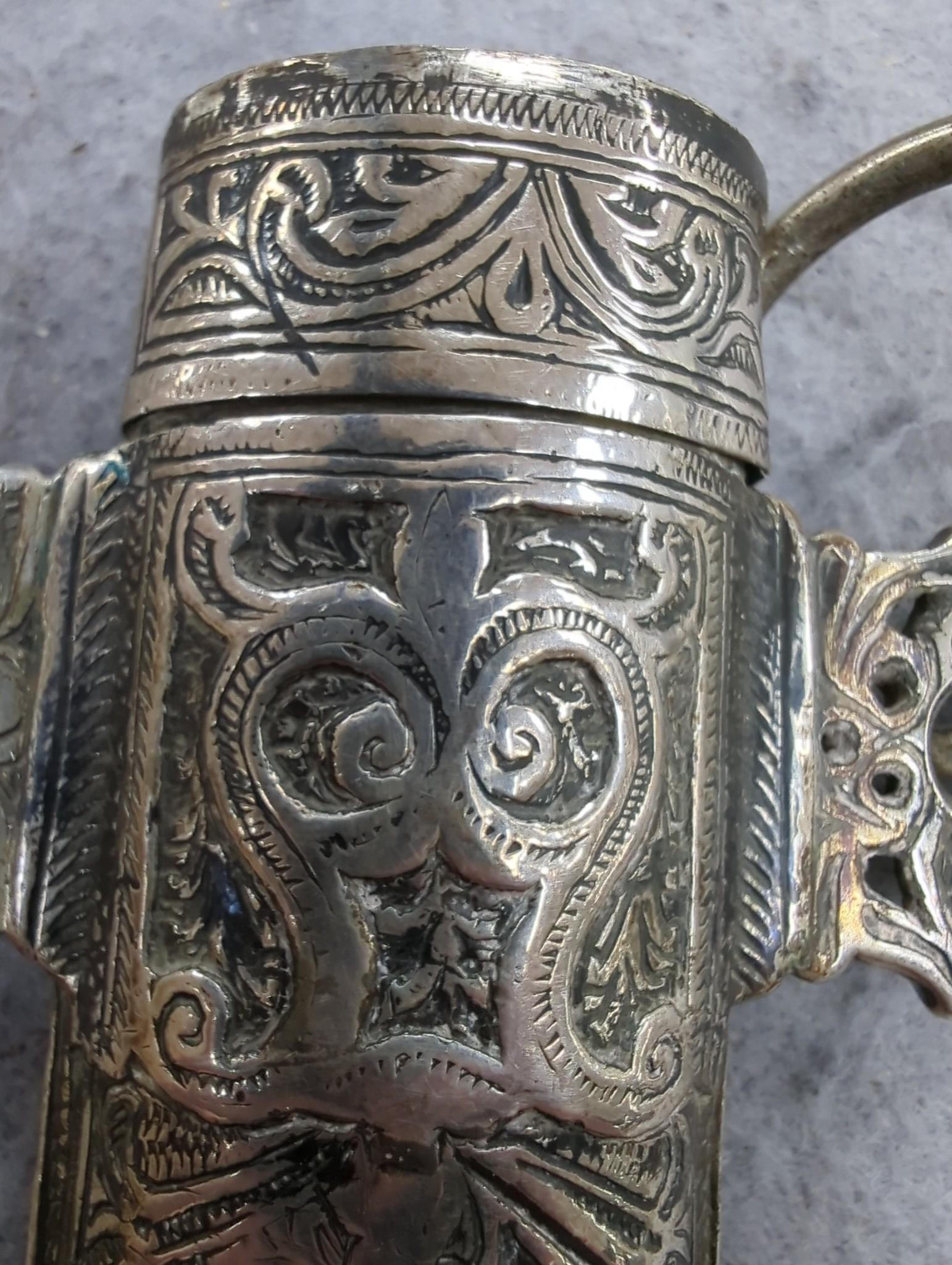 An Eastern white metal mounted dagger, a quantity of Eastern metalware and a white metal-mounted cup